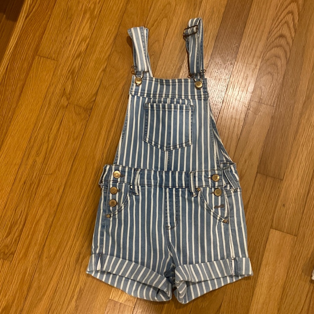 Blue and white striped jumper